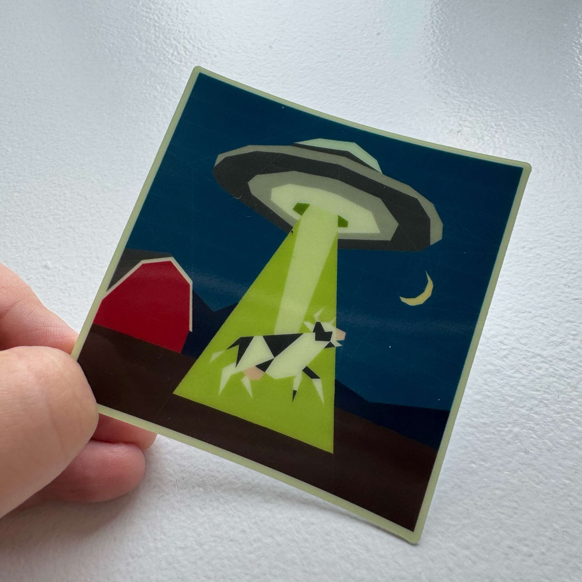 Udderly Out of This World Sticker: GLOW IN THE DARK UFO Cow Abduction Sticker - Image 1